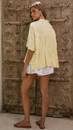Women's tie-front peplum blouse with collared neckline