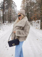 Women's oversized faux fur jacket with long sleeves