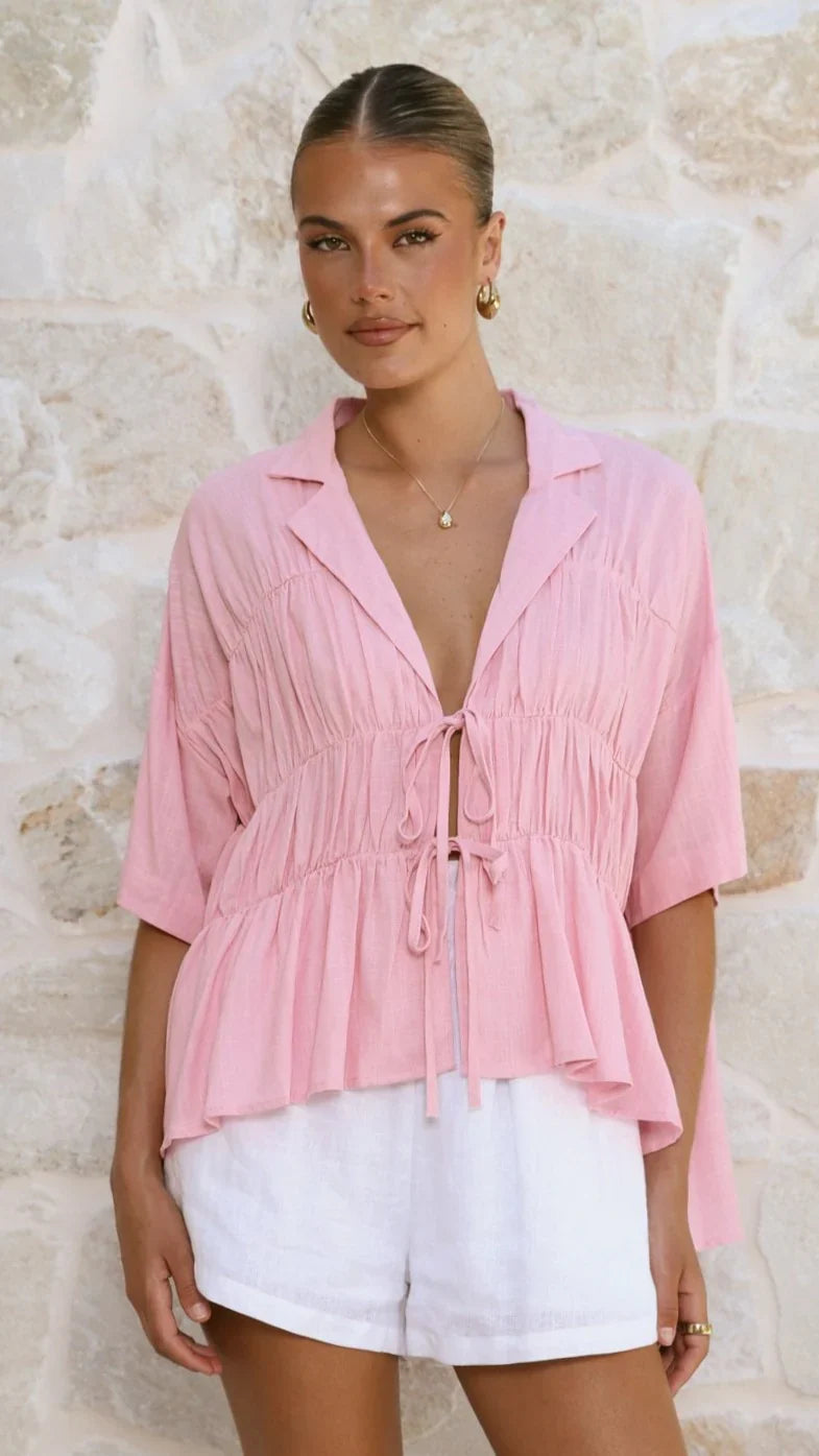 Women's tie-front peplum blouse with collared neckline