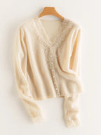 Women's lace cardigan with open-knit pattern