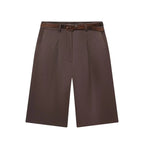 Women's high-waisted pleated bermuda shorts with belt