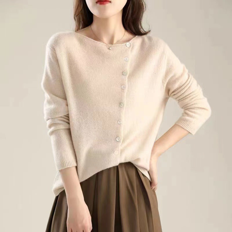 Women's asymmetric sweater with button detail