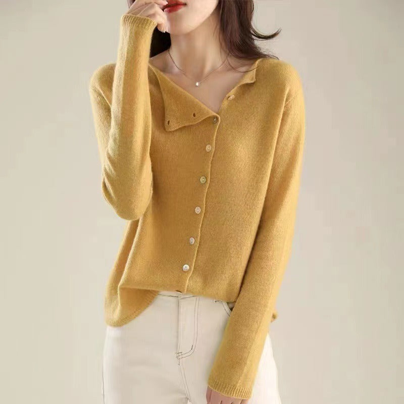 Women's asymmetric sweater with button detail