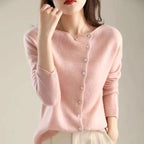 Women's asymmetric sweater with button detail