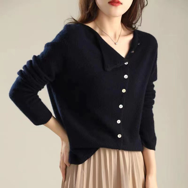 Women's asymmetric sweater with button detail