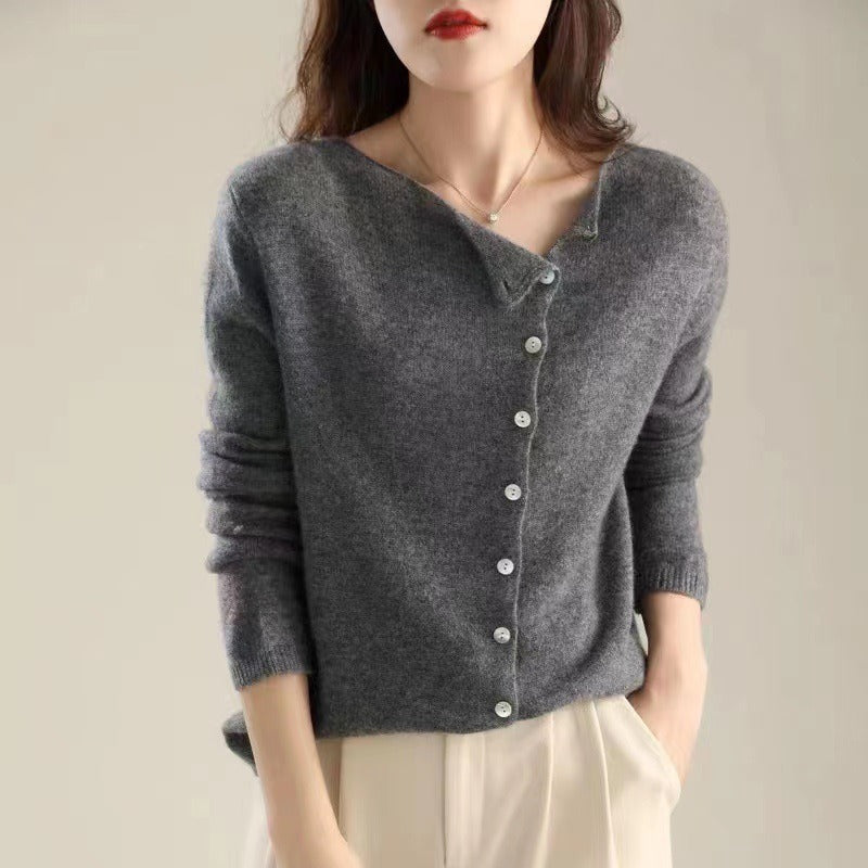 Women's asymmetric sweater with button detail