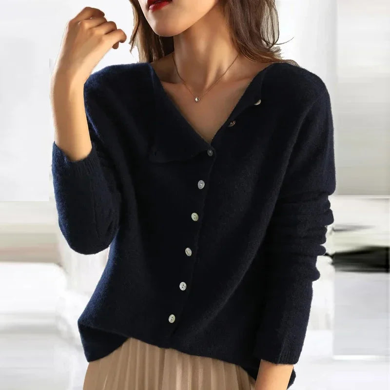 Women's asymmetric sweater with button detail