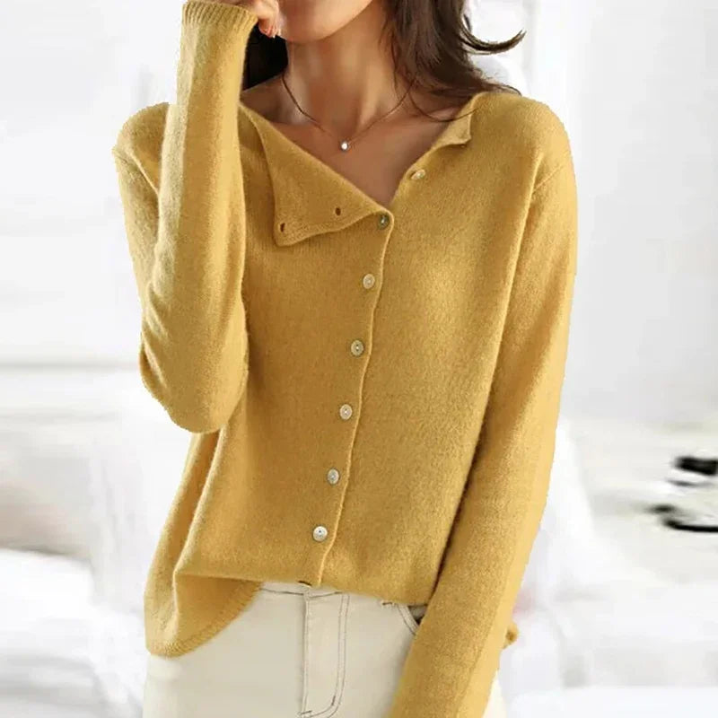 Women's asymmetric sweater with button detail