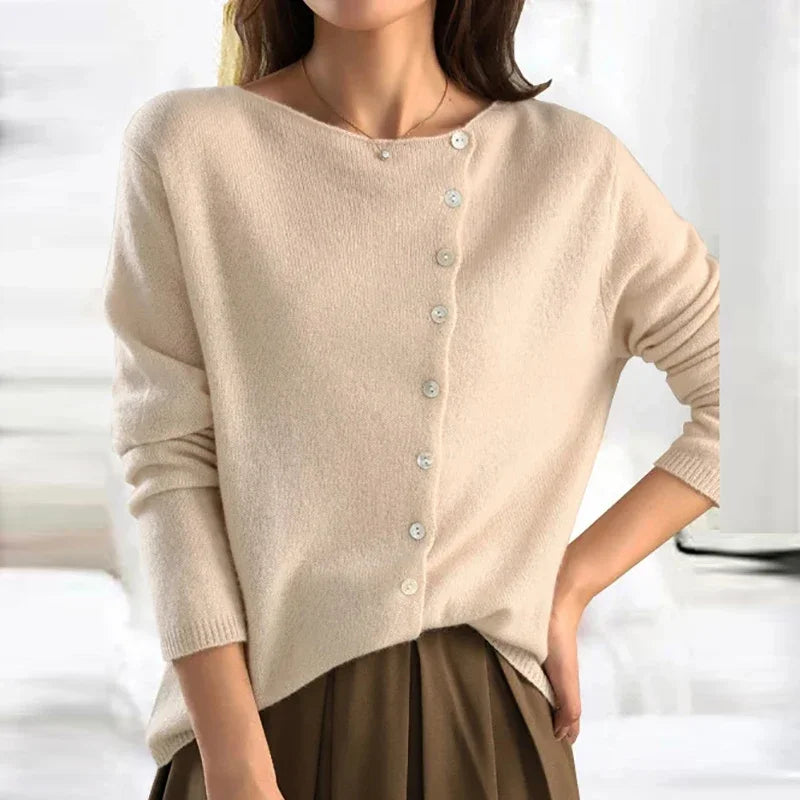 Women's asymmetric sweater with button detail