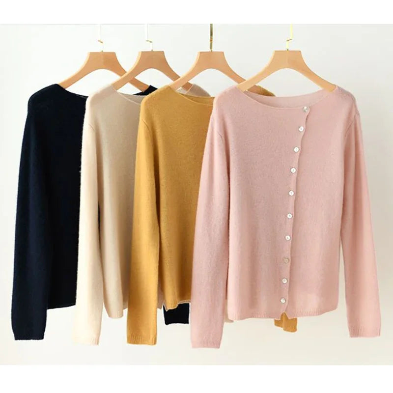 Women's asymmetric sweater with button detail