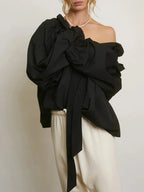 Women's blouse with puffed sleeves and fitted body