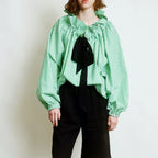 Women's blouse with puffed sleeves and fitted body