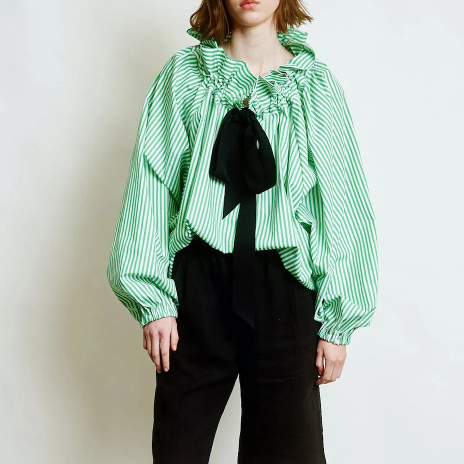 Women's blouse with puffed sleeves and fitted body