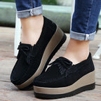 Women's bow and tassel slip-on platform shoes