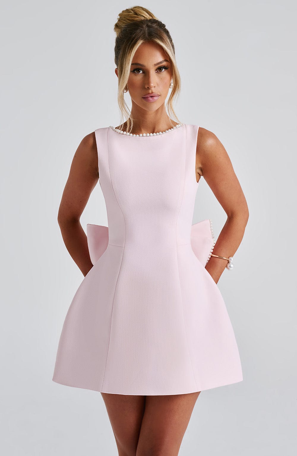 Women's bow-back sleeveless mini party dress