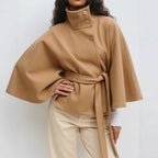 Women's cape coat with open front and arm openings