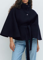 Women's cape coat with open front and arm openings