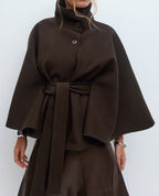 Women's cape coat with open front and arm openings