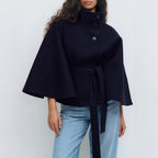 Women's cape coat with open front and arm openings