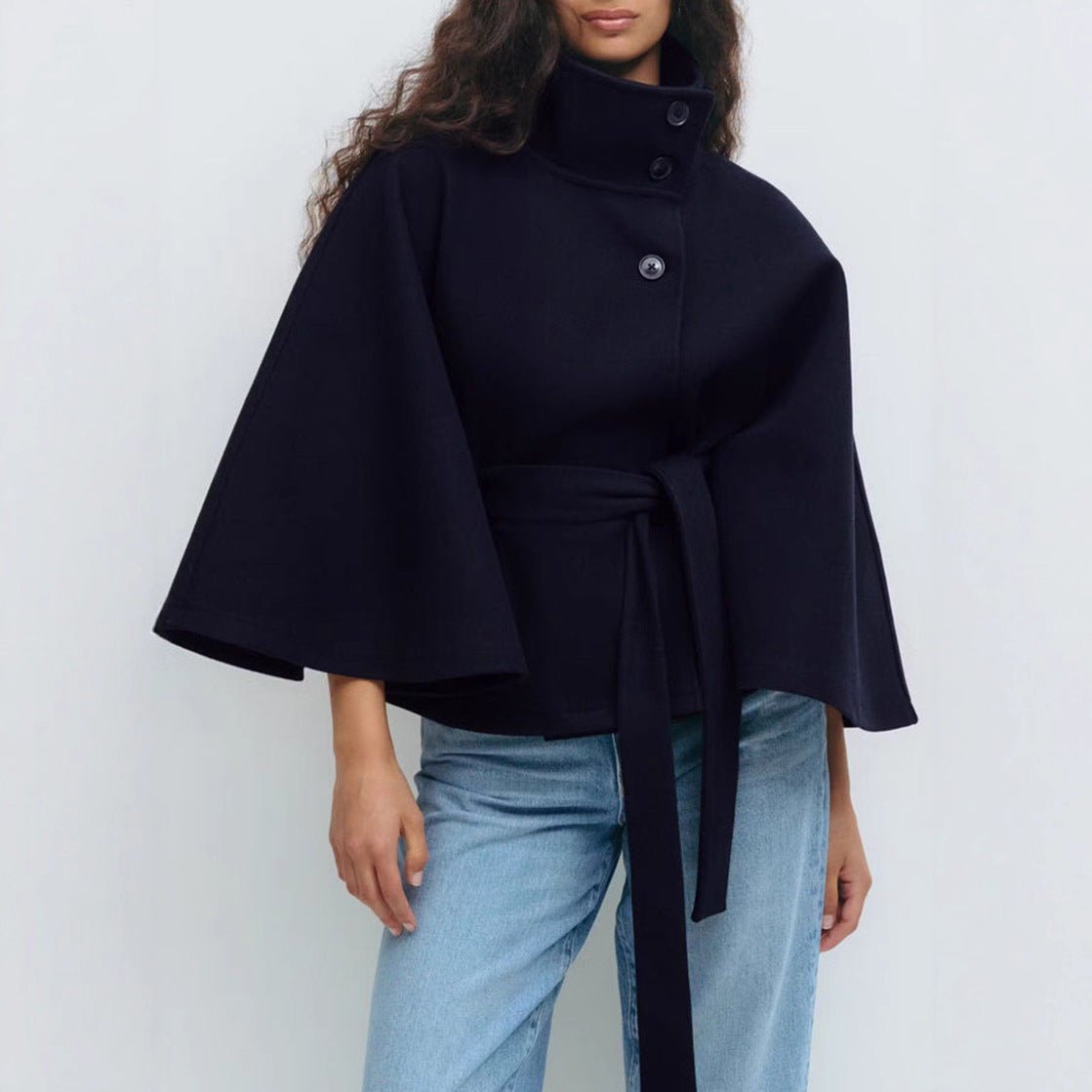 Women's cape coat with open front and arm openings