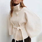 Women's cape coat with open front and arm openings