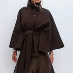 Women's cape coat with open front and arm openings