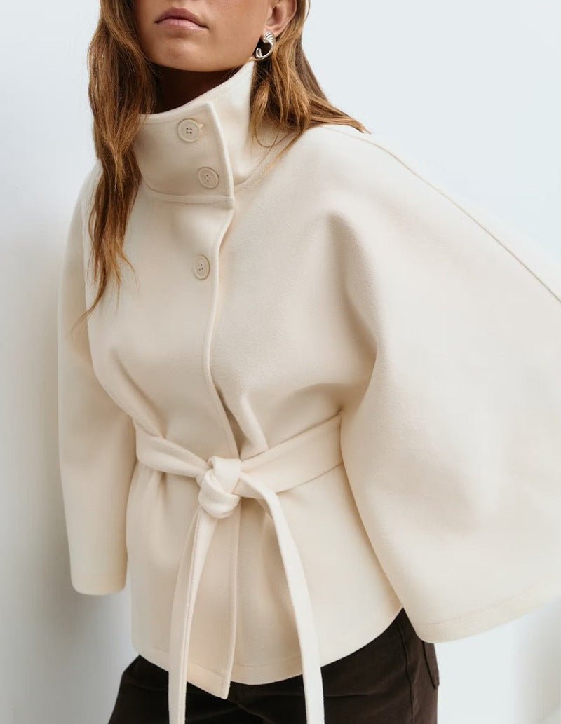 Women's cape coat with open front and arm openings