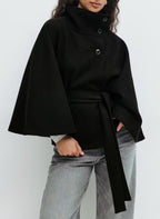 Women's cape coat with open front and arm openings