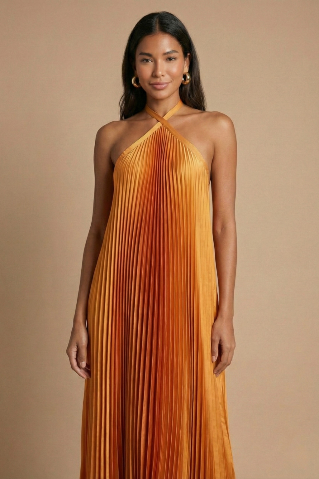 Women's halter neck maxi dress with open back and pleated skirt