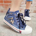 Women's high-top denim sneakers with zip detail and lace-up front
