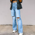 Women's high-waisted ripped knee jeans