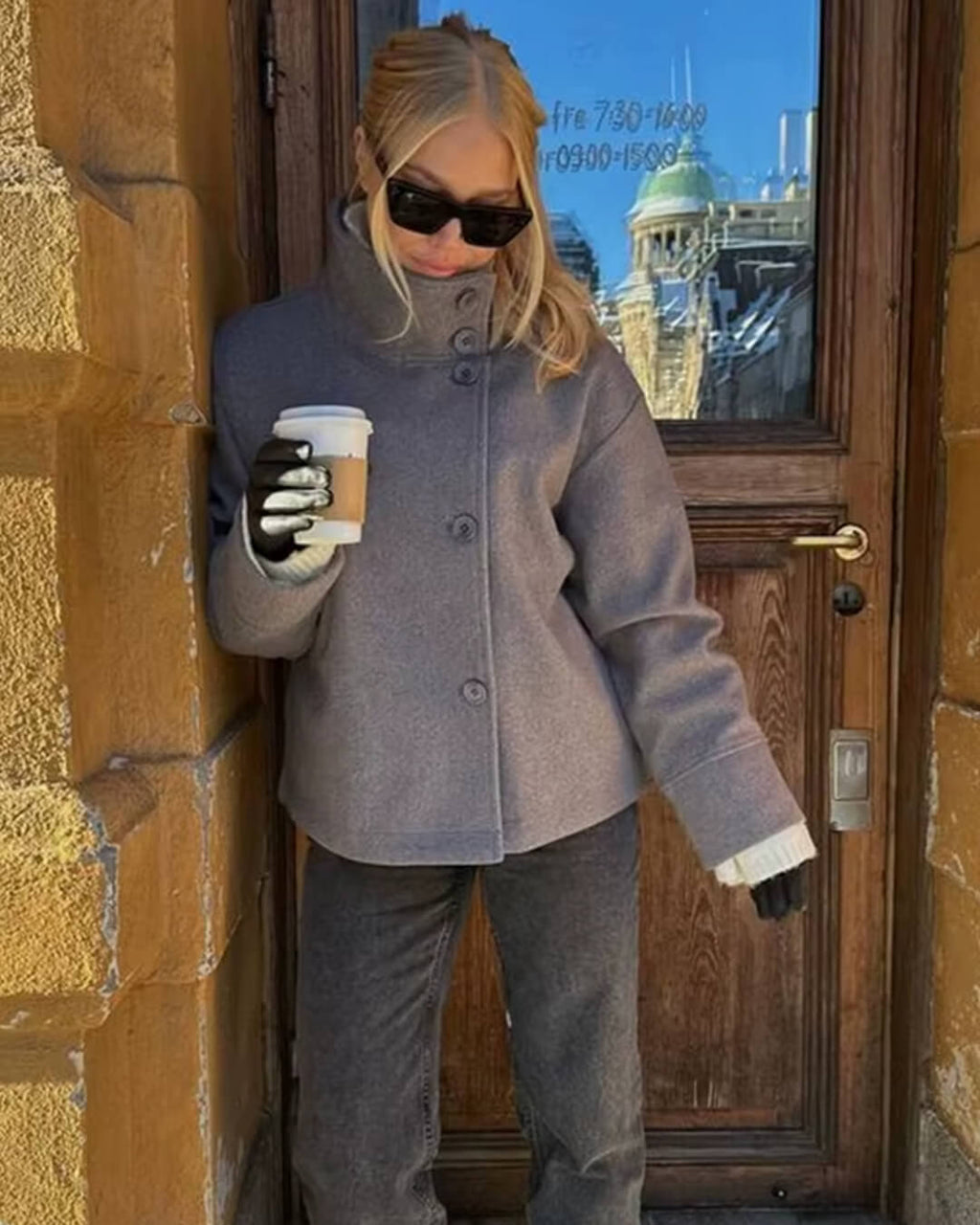 Women's jacket with stand-up collar and front fastening