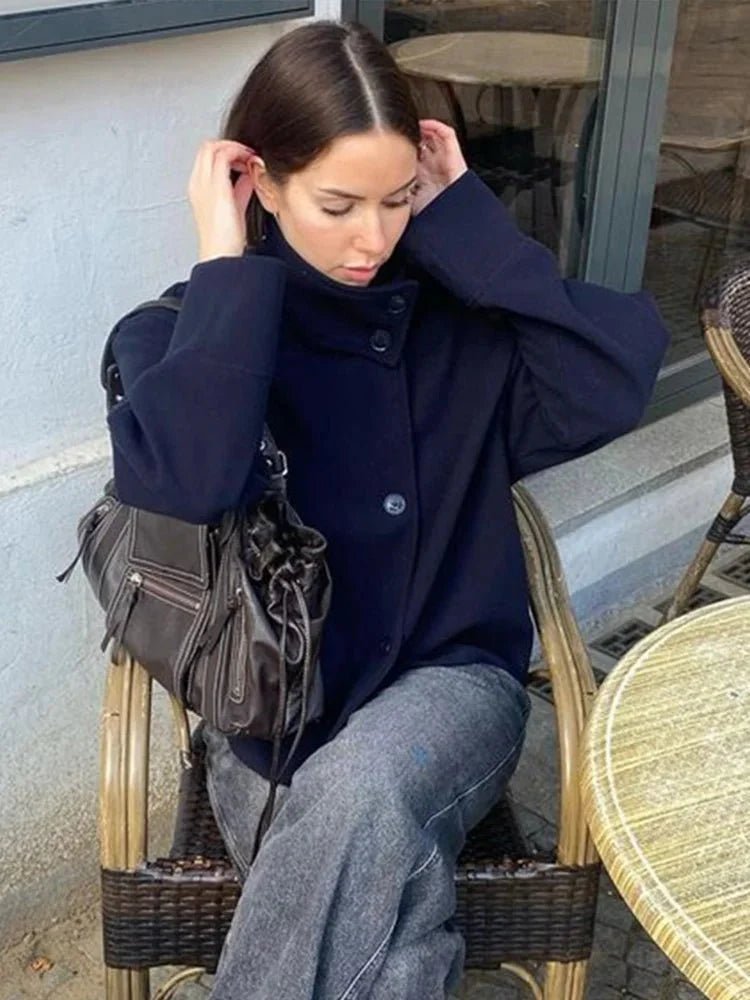 Women's jacket with stand-up collar and front fastening