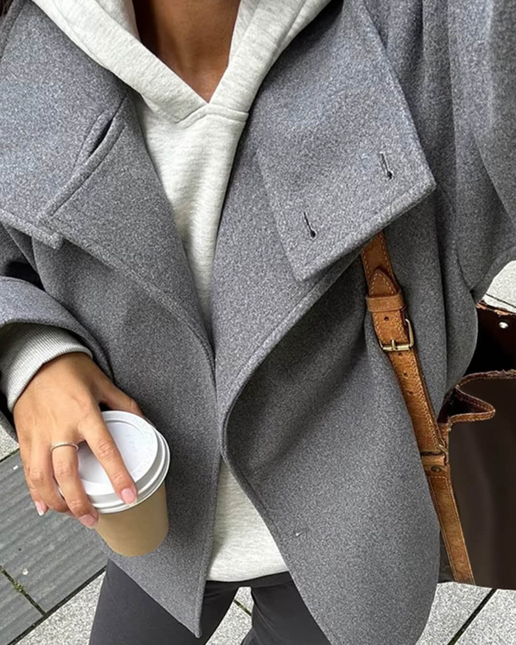 Women's jacket with stand-up collar and front fastening
