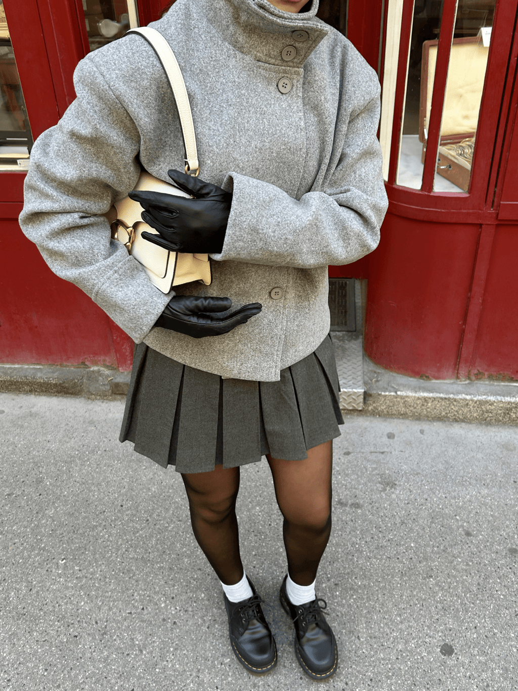 Women's jacket with stand-up collar and front fastening