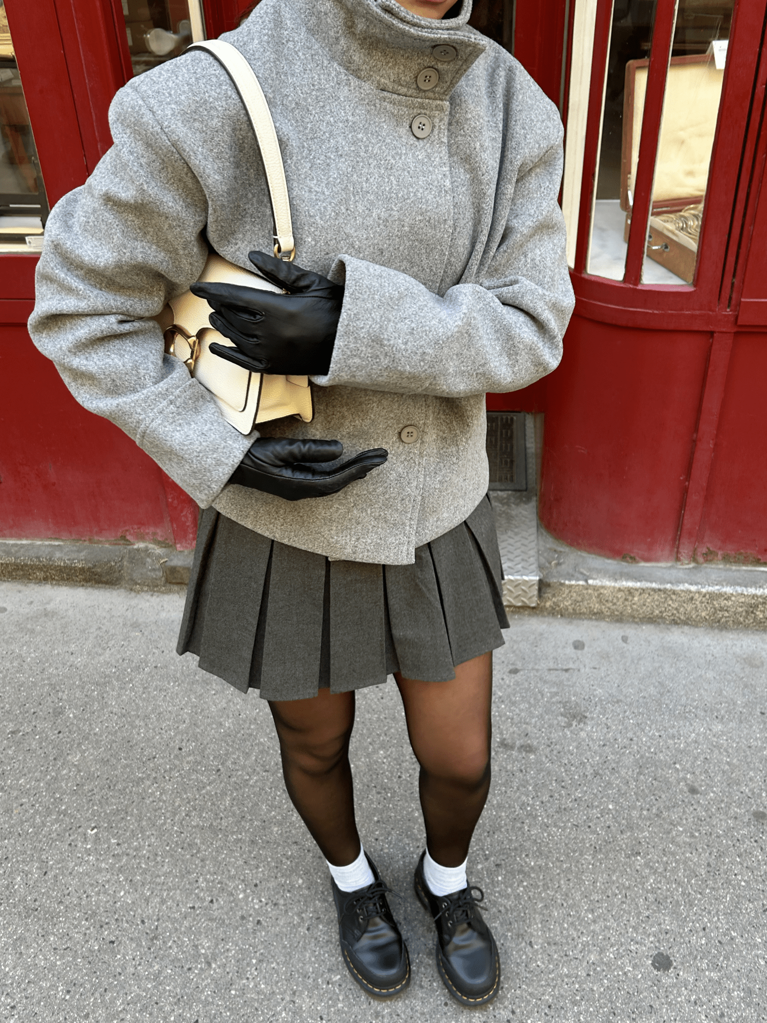 Women's jacket with stand-up collar and front fastening