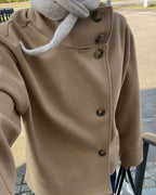 Women's jacket with stand-up collar and front fastening