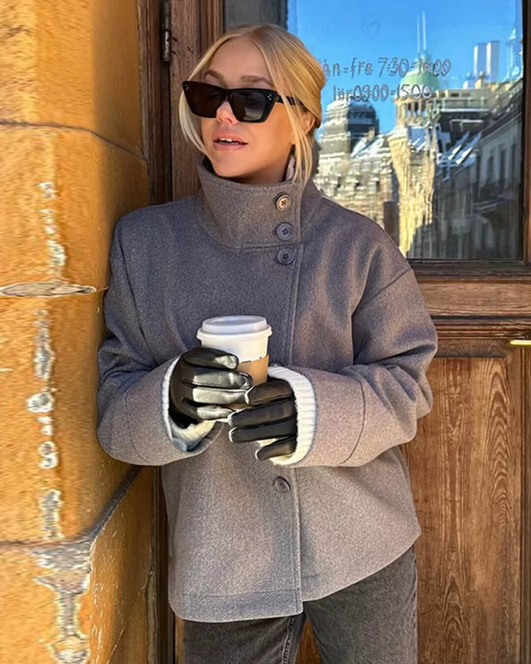 Women's jacket with stand-up collar and front fastening