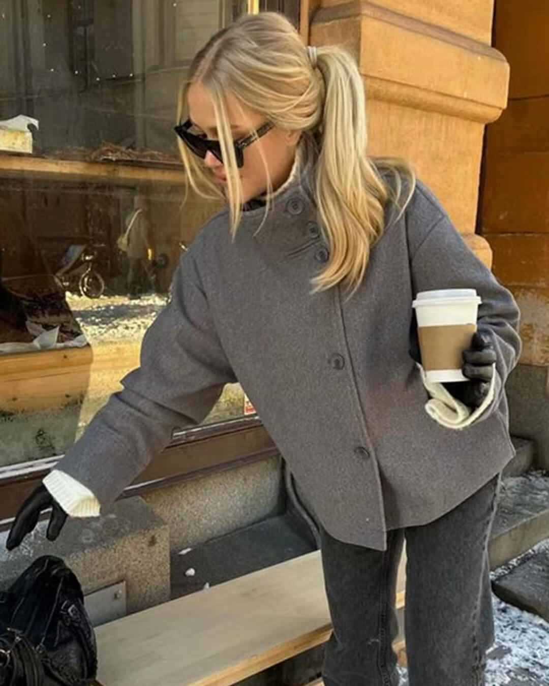 Women's jacket with stand-up collar and front fastening