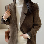Women's longline tailored coat with button fastening