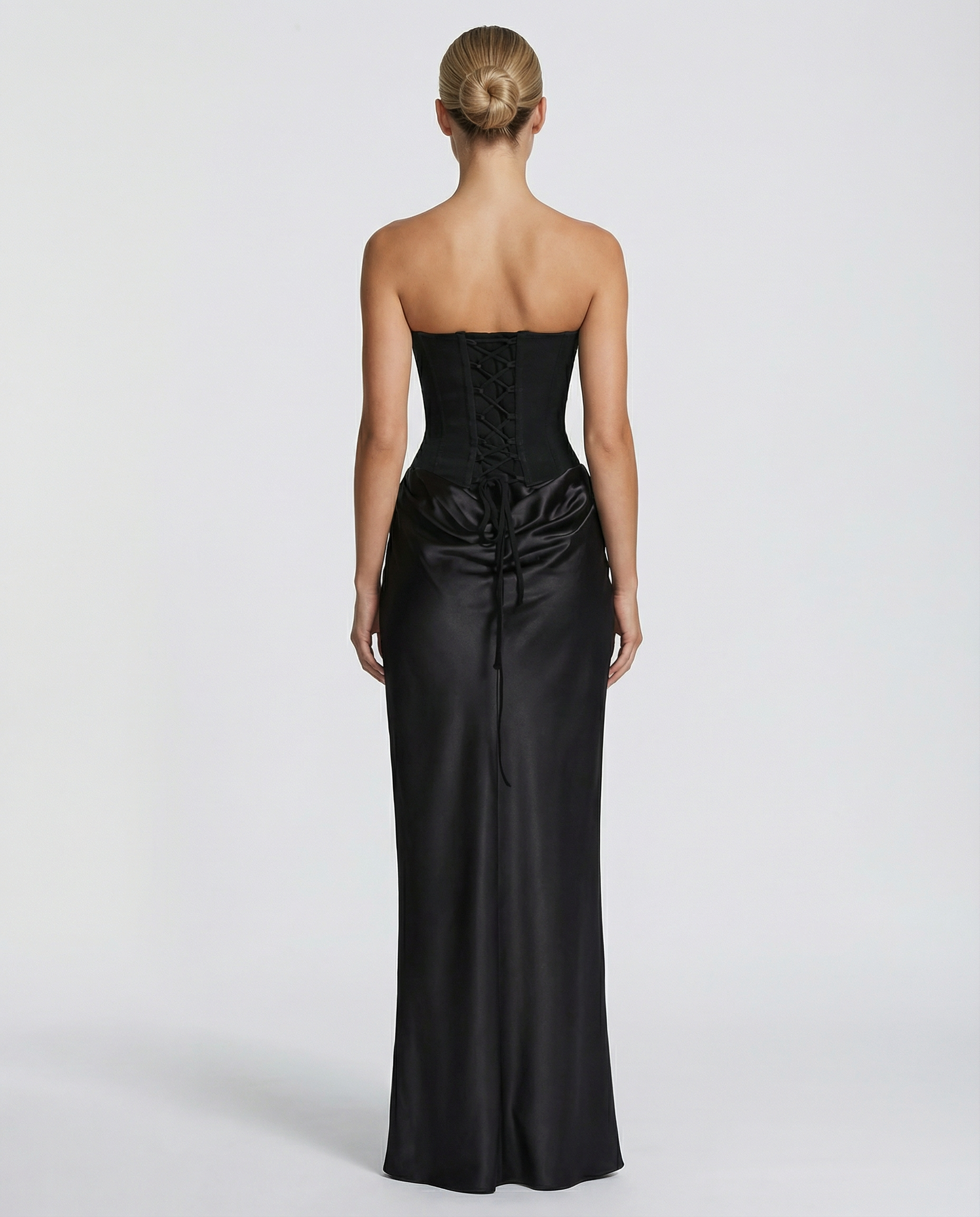 Women's maxi dress with strapless corset and draped skirt