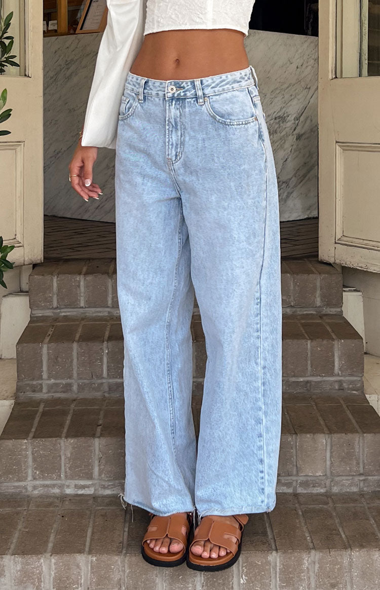 Women's mid-rise wide leg jeans with raw hem