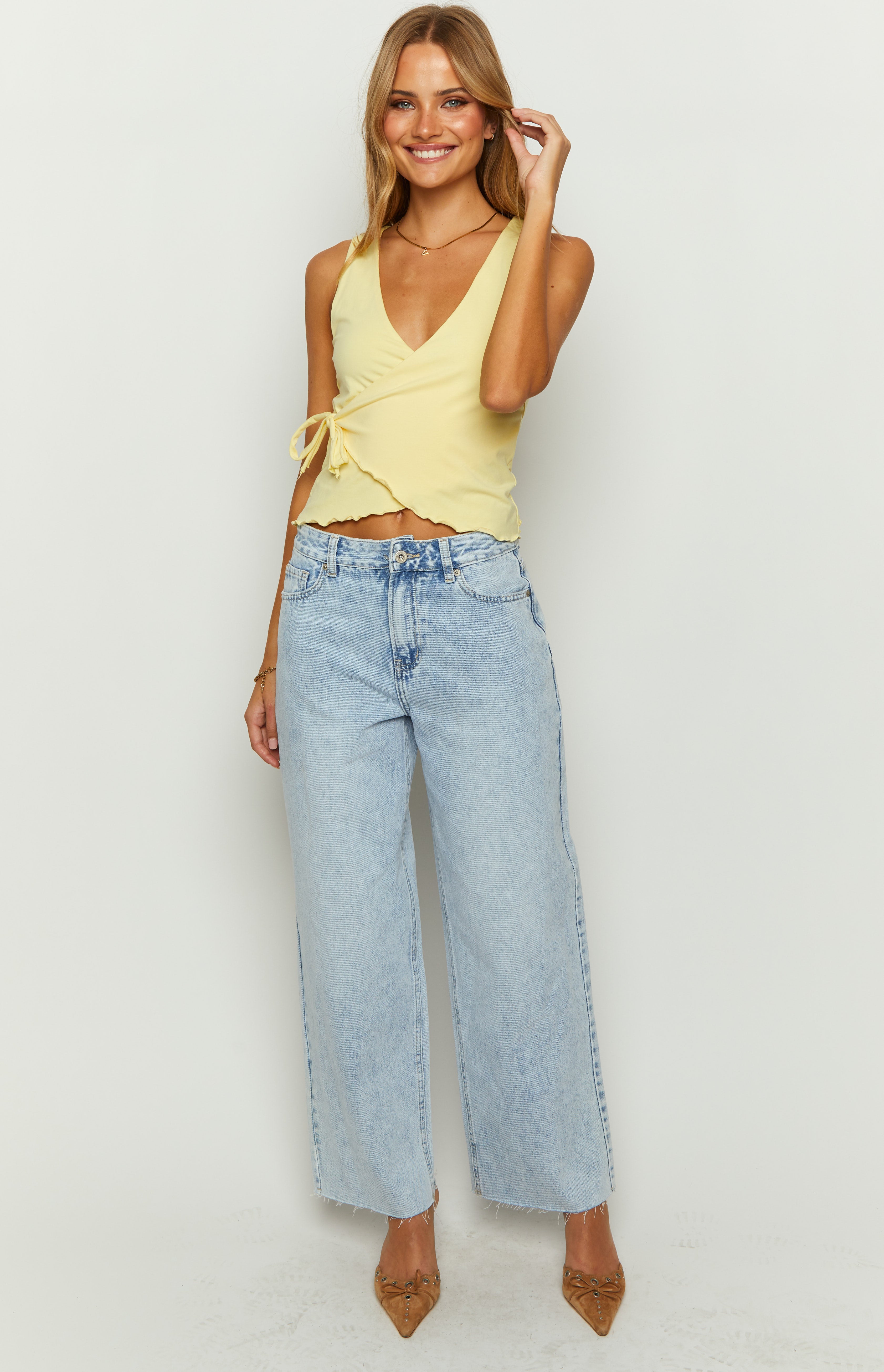 Women's mid-rise wide leg jeans with raw hem