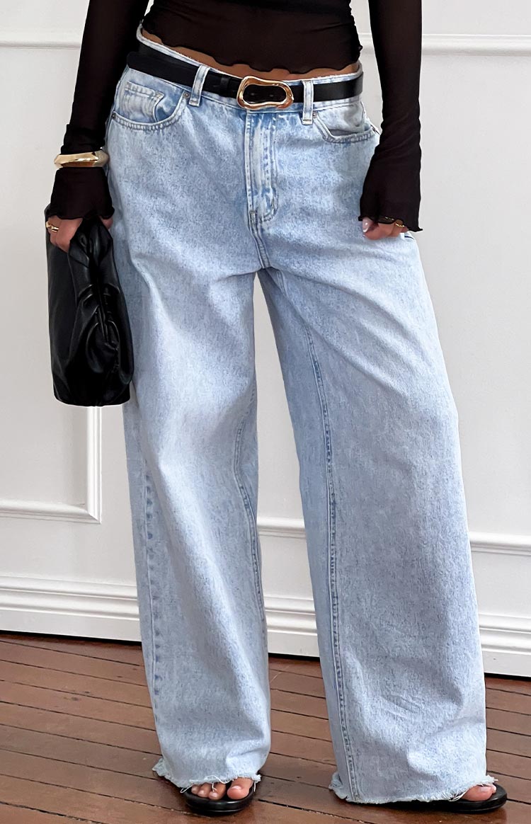 Women's mid-rise wide leg jeans with raw hem