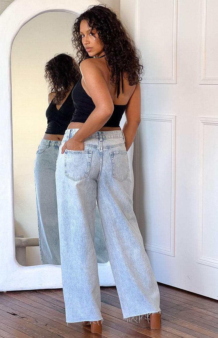 Women's mid-rise wide leg jeans with raw hem