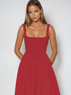 Women's midi dress with fitted bodice