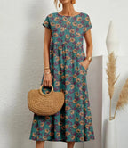 Women's midi dress with floral print and pockets