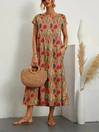 Women's midi dress with floral print and pockets