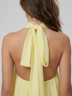 Women's mini dress with halter neck, open back and tiered ruffle hem