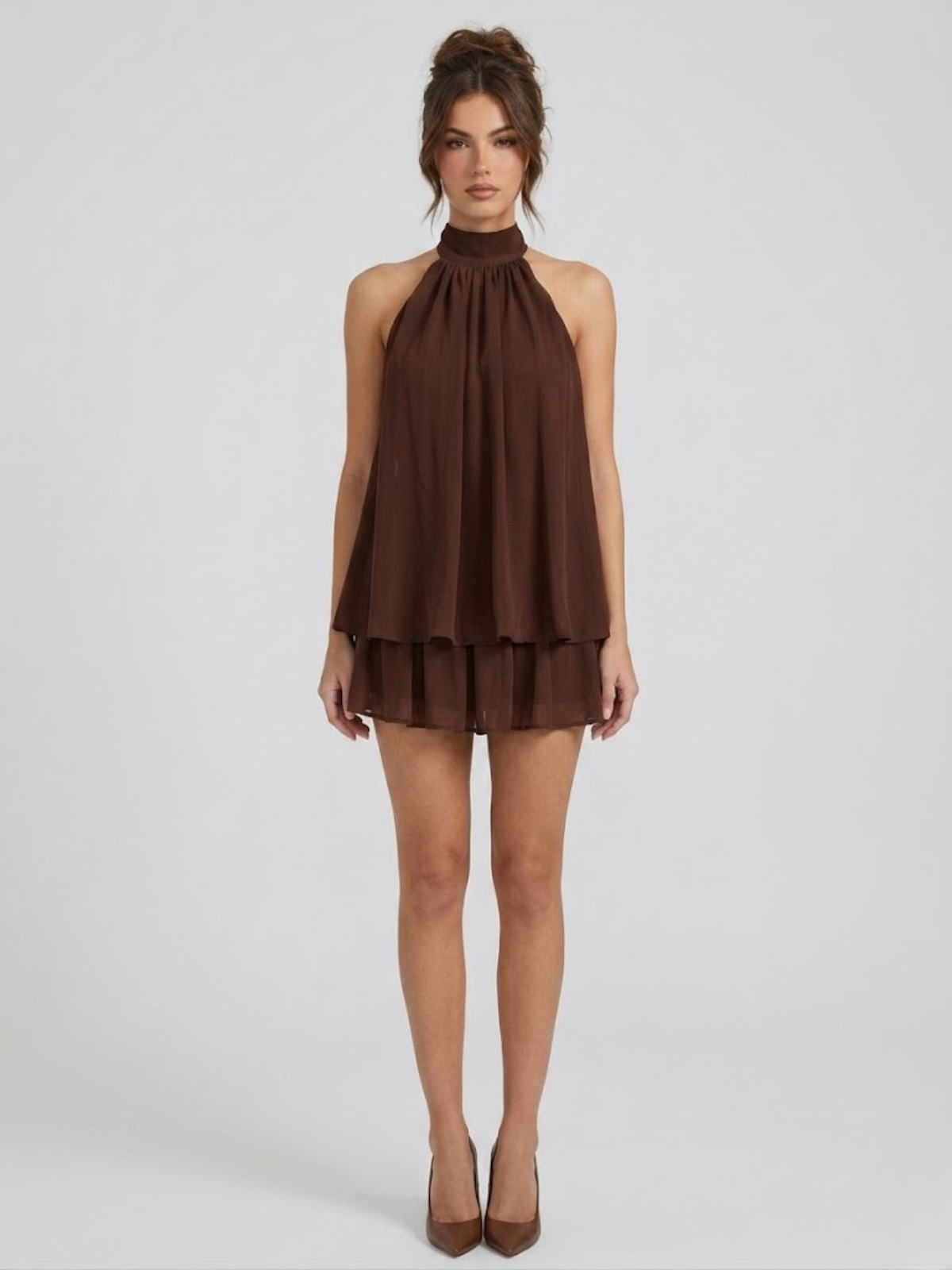 Women's mini dress with halter neck, open back and tiered ruffle hem